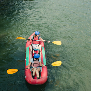 People having adventure on river, rafting. Boats top view.